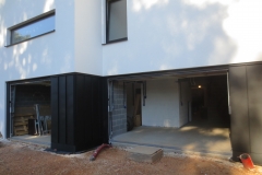 Construction d'une habitation - façade - crépi/panneau noir